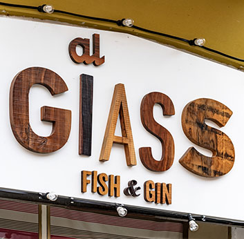 Insegna legno massello al Giass