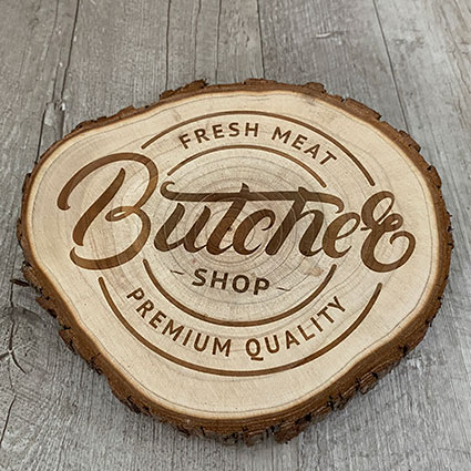 Lasercamp sezione di tronco inciso a laser